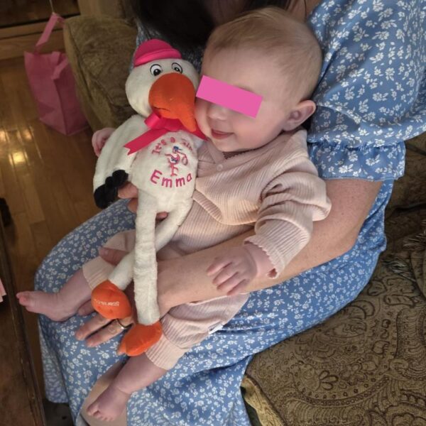 Emma with Pink Plush Stork
